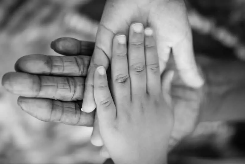 What Does The Bible Say About Trusting God Completely Right Now? 3 an image of hands overlapping featured image for What Does The Bible Say About Trusting God Completely Right Now?